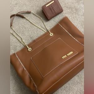 Steve Madden brown leather tote with white sherpa lining
